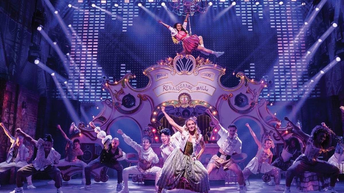 Cast members dancing on stage during the & Juliet play